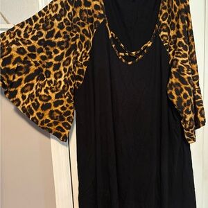Elegant Black Tunic with Leopard Print Sleeves